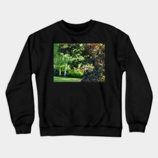 Red car hiding in the trees Crewneck Sweatshirt